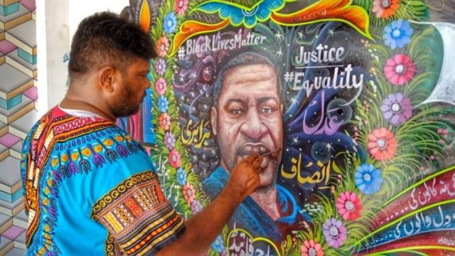 A Pakistani truck artist painted a mural in his home in memory of George Floyd