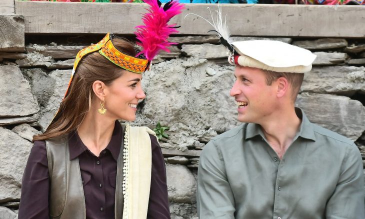 Britain's Prince William and Catherine, Duchess of Cambridge look at each other while visiting a settlement of the Kalash people in Chitral, Pakistan, October 16, 2019.
