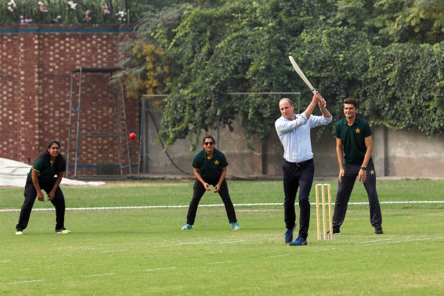 Britain's Prince William plays a shot during his visit at the National Cricket Academy in Lahore, Pakistan October 17, 2019.