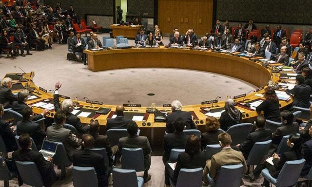 The Russian ambassador to the United Nations Vitaly Churkin abstains from a vote in the United Nations Security Council attempting to halt the escalating conflict in Yemen in New York