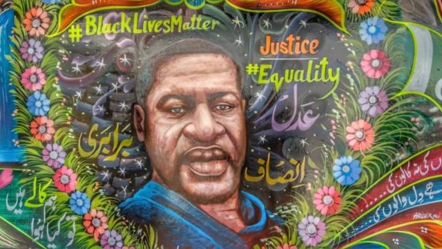 A Pakistani truck artist painted a mural in his home in memory of George Floyd